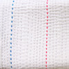 Ivory with coloured stitch quilt