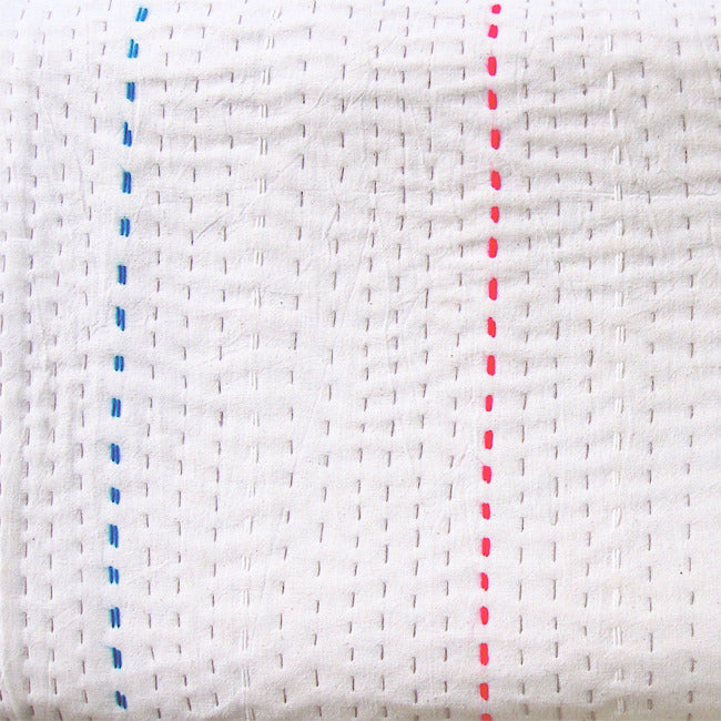 Ivory with coloured stitch quilt