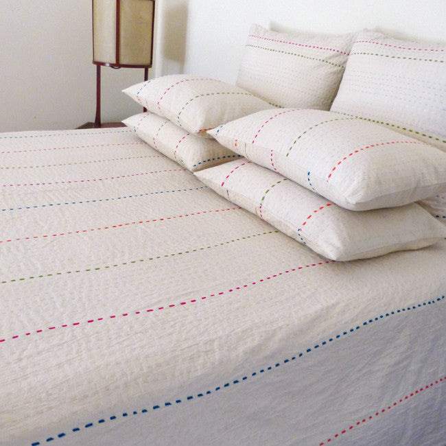 Ivory with coloured stitch quilt